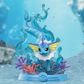 Toy figure of a blue and yellow creature with aquatic elements on a blue background