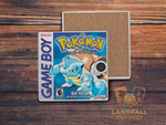 Blue retro handheld video game cartridge inspired ceramic coaster, 4x4 square, water-resistant gaming room desk accessory.